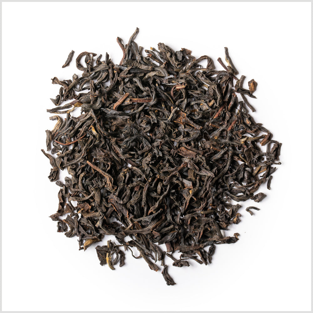 Circular pile of loose-leaf black British Brunch tea.