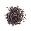 Circular pile of full leaf black tea.