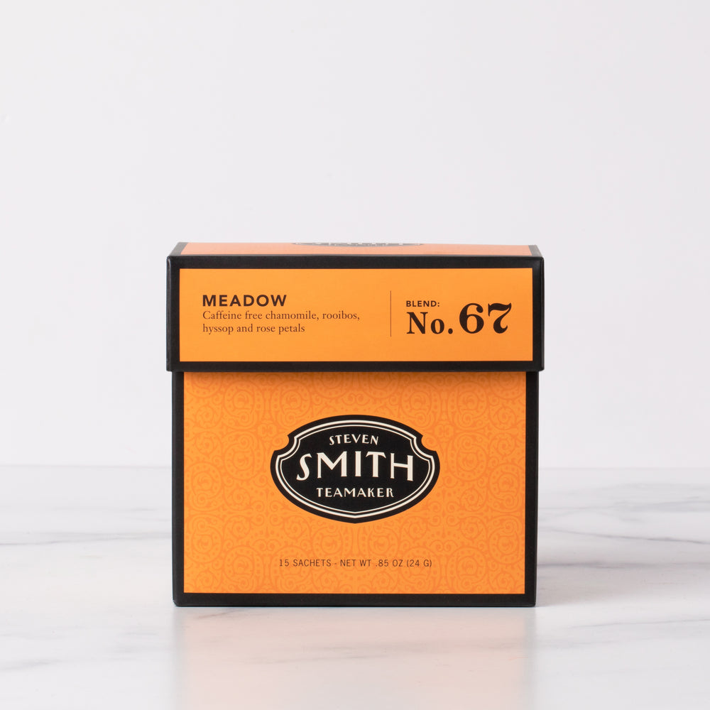 Orange box of Meadow full-leaf black tea sachets with Smith shield in center of box.