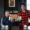 Dave Phinney holding bottle of DIGITS bourbon next to Scottie Pippen holding carton of tea.