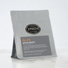 Grey bag with black British Brunch label and Smith logo.