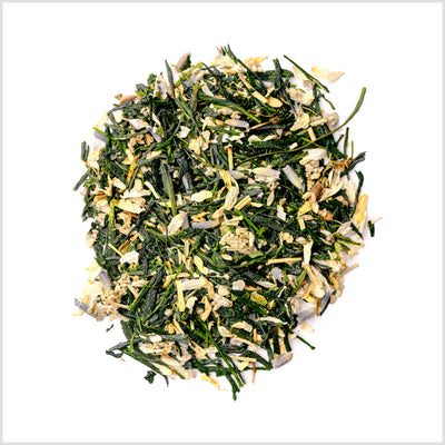 Pile of loose leaf Garden Party green tea to show gyokuro green tea, lavender, hyssop, rosemary and chamomile.