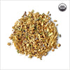 Circular pile of ginger. USDA Organic certification emblem 