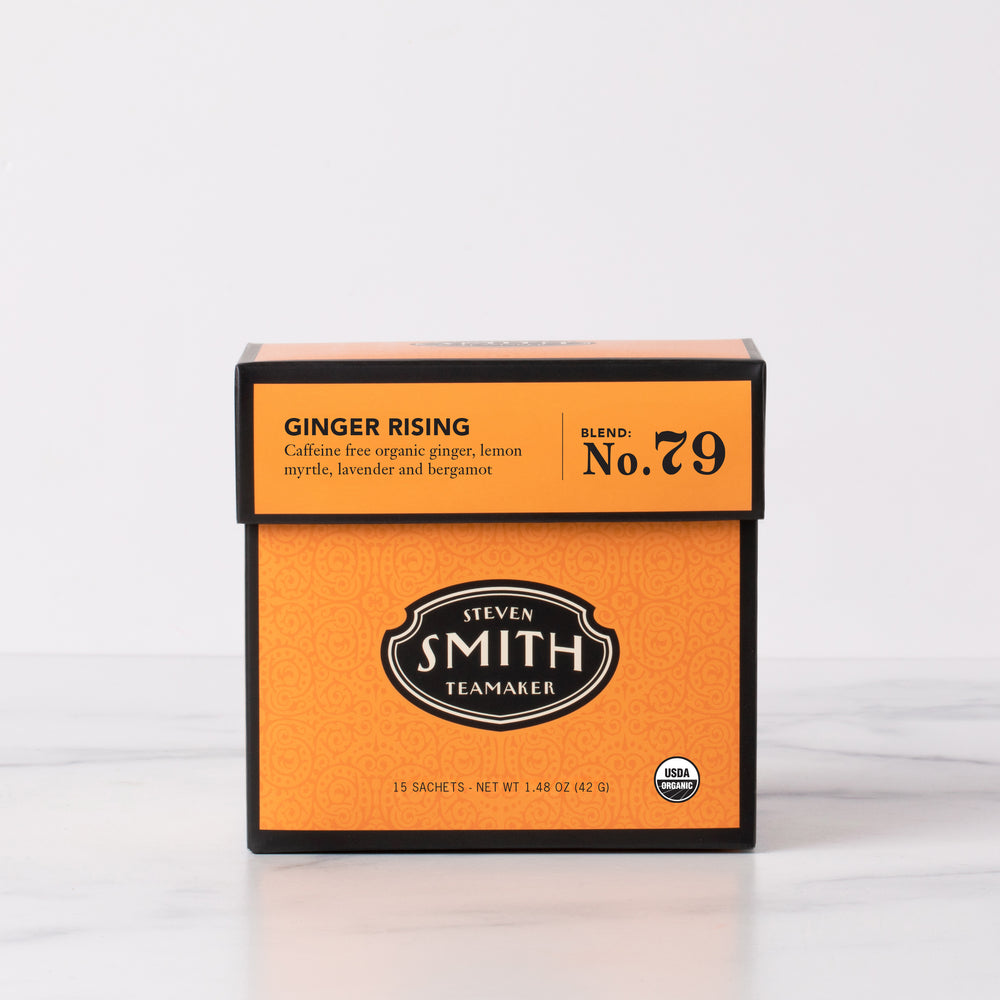 Orange box of Steven Smith Teamaker Ginger Rising tea on a white background