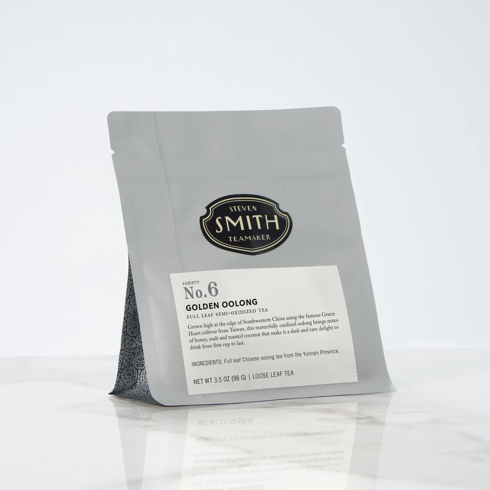 Gray bag of loose leaf tea with Smith shield and Golden Oolong label