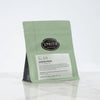 Green bag of loose leaf tea with Smith shield and Jasmine Pearls label