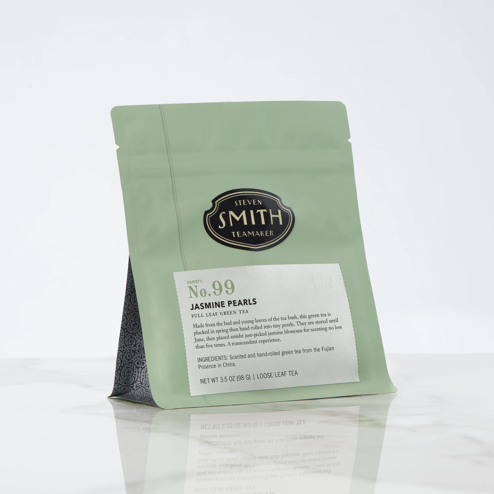 Green bag of loose leaf tea with Smith shield and Jasmine Pearls label