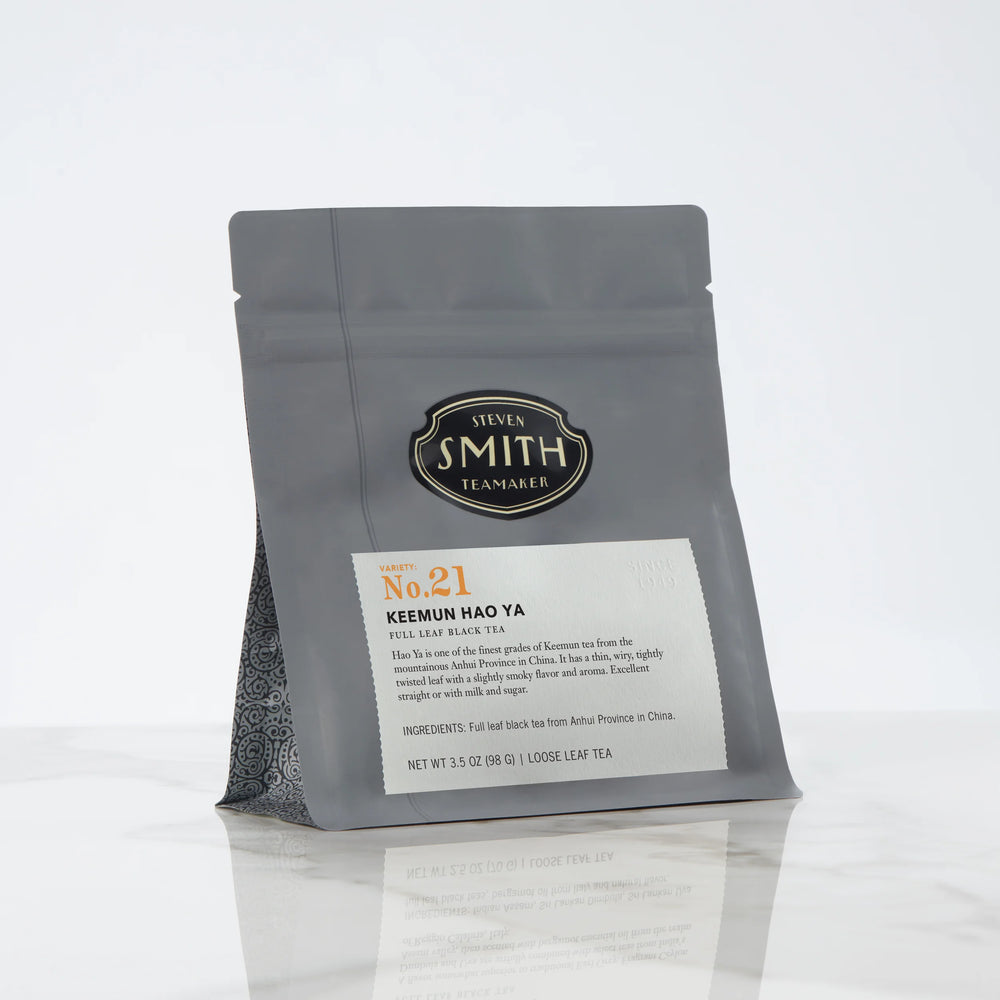 Black bag of loose leaf tea with Smith shield and Keemun Hao Ya label