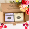 Top down view of gift box and boxes of Jasmine Nectar and Empower Mint.