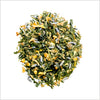 Pile of loose leaf Tokyo Twilight green tea to show full leaf green tea, lavender, green rooibos and tulsi.