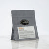 Black bag of loose leaf tea with Smith shield and Zheng Shan label