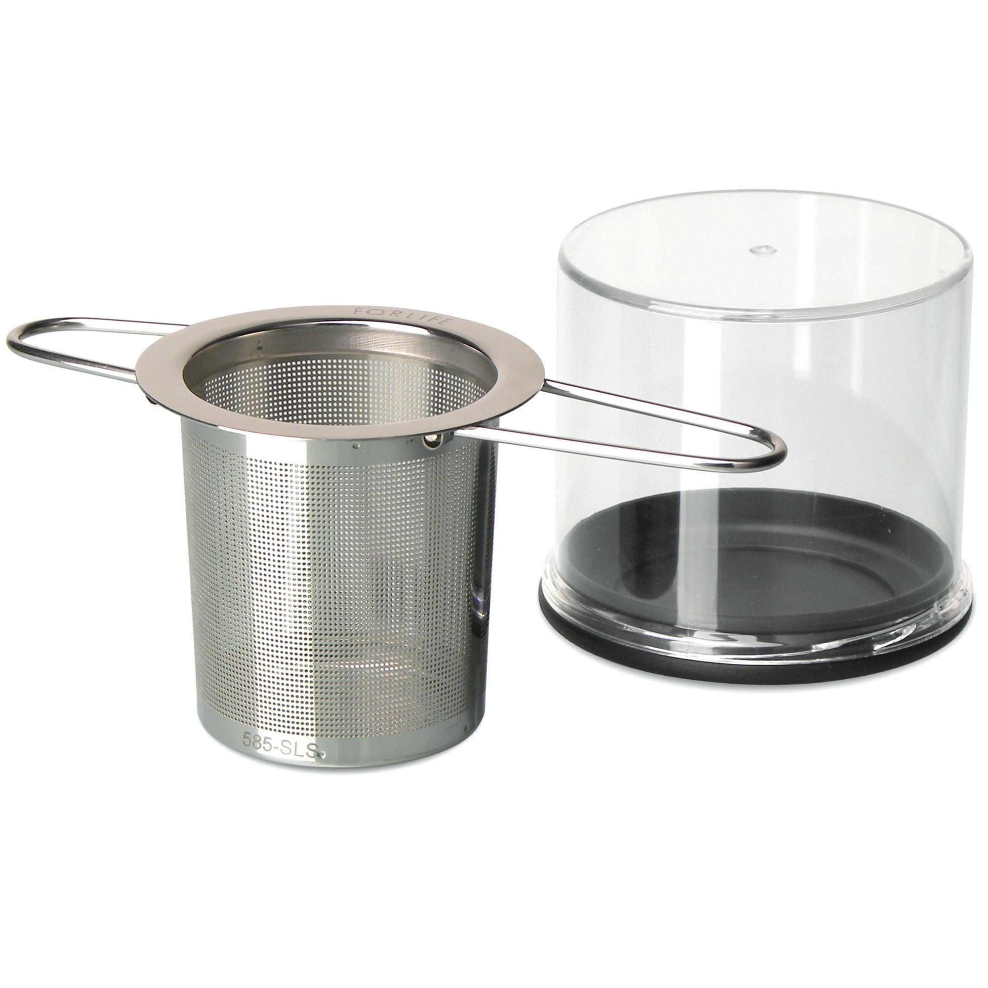 Stainless steel circular strainer with holes and two handles that are open.