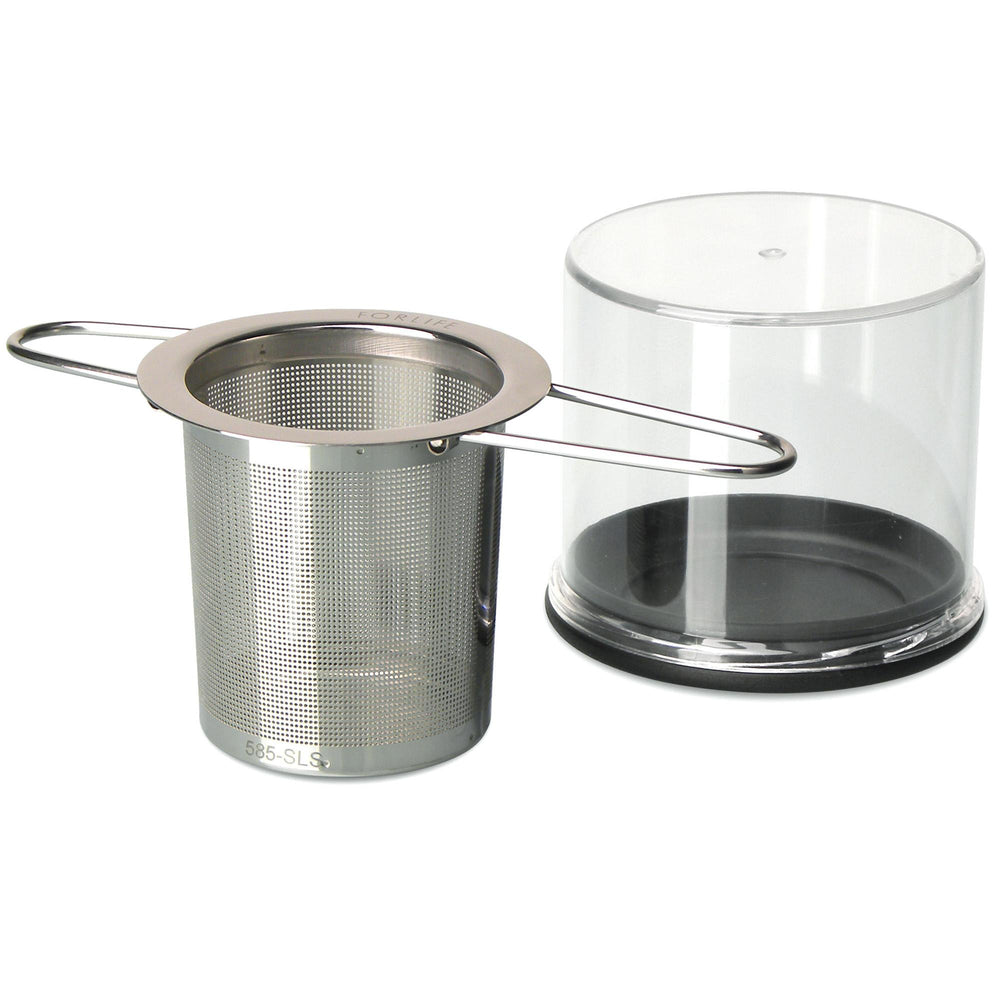 Stainless steel circular strainer with holes and two handles that are open.